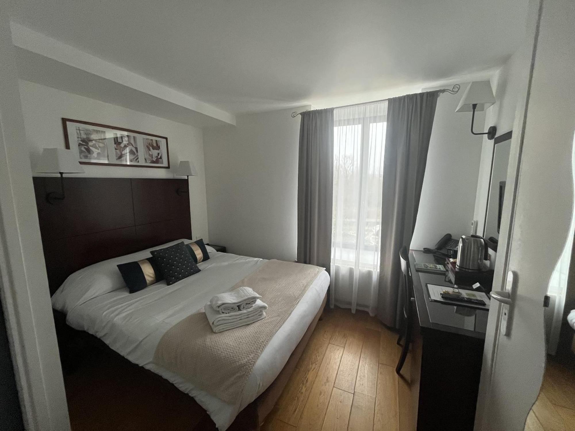 Logis Le Marronnier Hotel Buffon Quarto foto